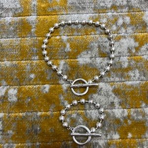 UNO DE 50 necklace and bracelet